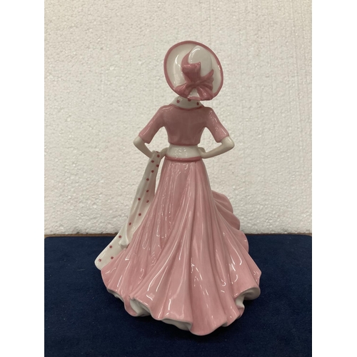 719 - A BONE CHINA COALPORT LADY FIGURINE HAND DECORATED AND MODELLED BY JACK GLYNN 