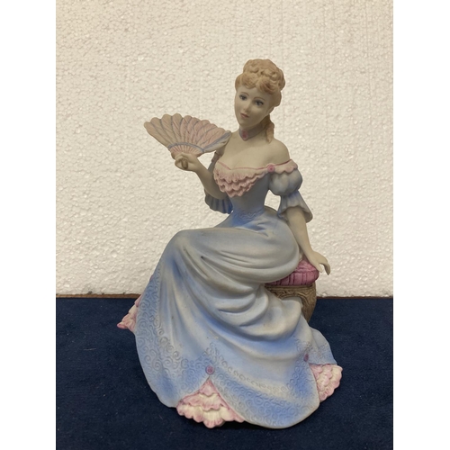 720 - A COALPORT HAND DECORATED PORCELAIN FIGURINE WITH A MATT FINISH - AGE OF ELEGANCE 