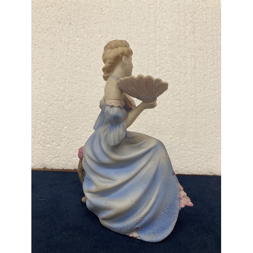 720 - A COALPORT HAND DECORATED PORCELAIN FIGURINE WITH A MATT FINISH - AGE OF ELEGANCE 