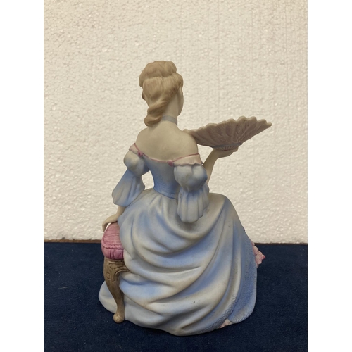 720 - A COALPORT HAND DECORATED PORCELAIN FIGURINE WITH A MATT FINISH - AGE OF ELEGANCE 