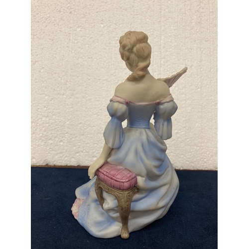 720 - A COALPORT HAND DECORATED PORCELAIN FIGURINE WITH A MATT FINISH - AGE OF ELEGANCE 