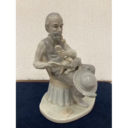 725 - A PORCELAIN FIGURINE OF A GENTLEMAN WITH DOG SMOKING A PIPE WHILST READING THE NEWSPAPER - SMALL CHI... 