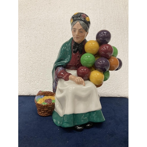 728 - A ROYAL DOULTON FIGURINE OF THE OLD BALLOON SELLER HN 1315 - HAND MADE AND HAND DECORATED - 19.5 CM