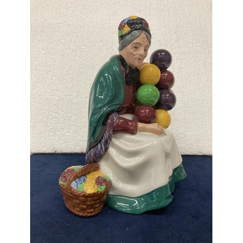 728 - A ROYAL DOULTON FIGURINE OF THE OLD BALLOON SELLER HN 1315 - HAND MADE AND HAND DECORATED - 19.5 CM