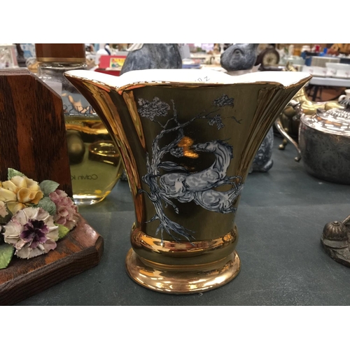 75 - TWO PIECES OF CROWN DEVON 'PEGASUS' IN BLACK AND A CROWN DEVON 'PEGASUS' VASE IN GOLD HEIGHT 17.5CM