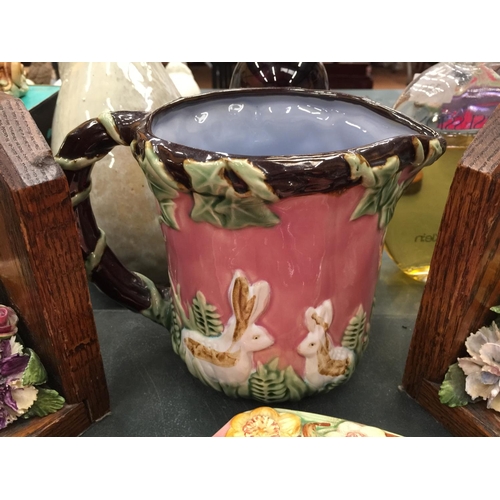 79 - A PAIR OF MAHOGANY BOOKENDS WITH FLORAL DISPLAY, ROSE BOUQUET PLATES AND A PINK FLORAL RABBIT JUG