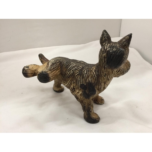 90 - A CAST FIGURE OF A DOG COCKING ITS LEG DOORSTOP HEIGHT 16CM, LENGTH 17CM