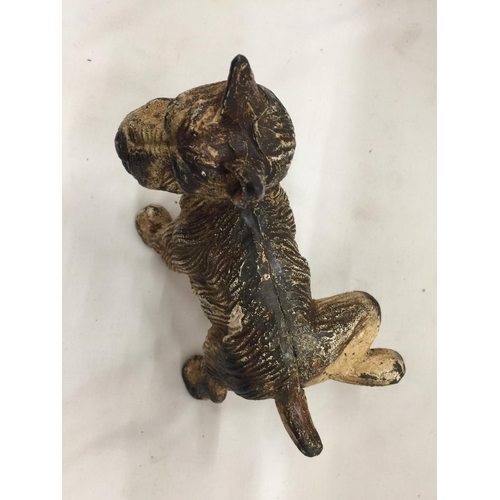 90 - A CAST FIGURE OF A DOG COCKING ITS LEG DOORSTOP HEIGHT 16CM, LENGTH 17CM