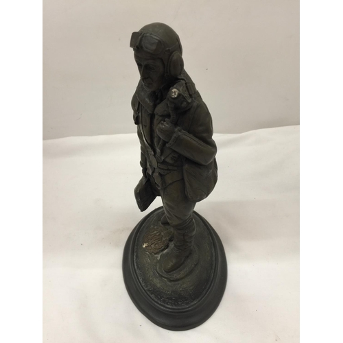 91 - A RESIN FIGURE OF AN R. A. F. AIRMAN HEIGHT 28.5CM