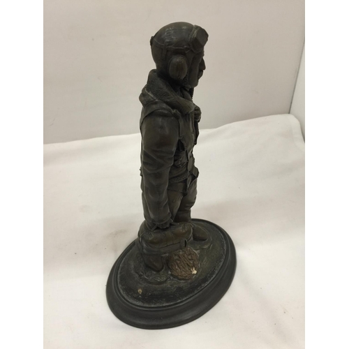 91 - A RESIN FIGURE OF AN R. A. F. AIRMAN HEIGHT 28.5CM