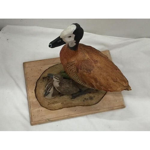 94 - A DAVID TOMLINSON CERAMIC WHITE FACED DUCK WITH DUCKLINGS, SIGNED TO THE BASE, HEIGHT APPROX 31CM, L... 