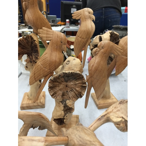 116 - A COLLECTION OF CARVED TREEN PARROTS AND MOOSES - 5 IN TOTAL