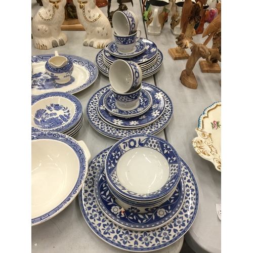 117 - A QUANTITY OF EMPIRE 'OLD WILLOW' PATTERN TO INCLUDE CUPS, SAUCERS, BOWLS, SERVING PLATE SAUCE JUGS,... 