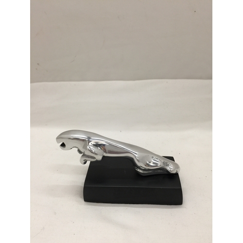 118 - A SMALL CHROME JAGUAR CAR MASCOT ON BASE HEIGHT 5.5CM, LENGTH 10CM