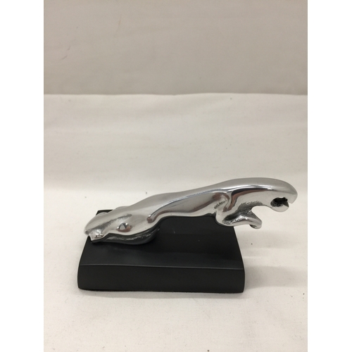 118 - A SMALL CHROME JAGUAR CAR MASCOT ON BASE HEIGHT 5.5CM, LENGTH 10CM