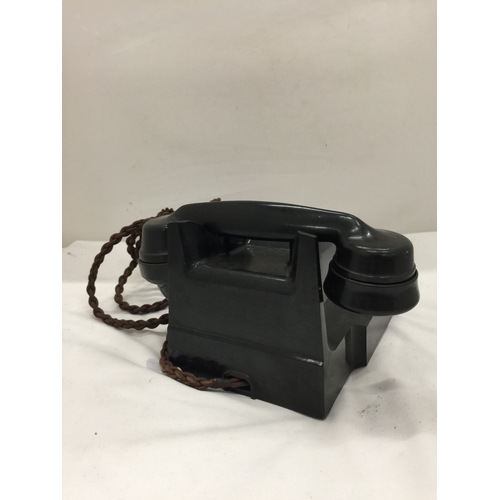 139 - A VINTAGE BLACK BAKELITE TELEPHONE WITH FRONT DIAL - MISSING FRONT TRAY