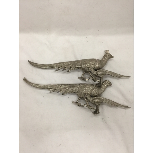 141 - A LARGE AND SMALLER  PAIR OF SILVER PLATED PHEASANTS