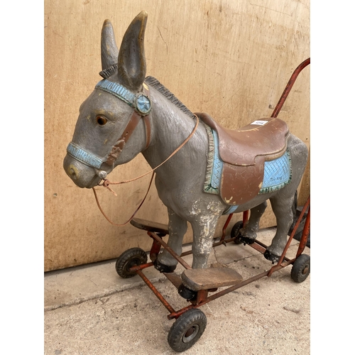 1214 - A VINTAGE 1950'S TRIANG PUSH ALONG DONKEY