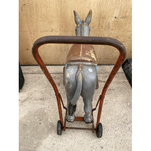 1214 - A VINTAGE 1950'S TRIANG PUSH ALONG DONKEY