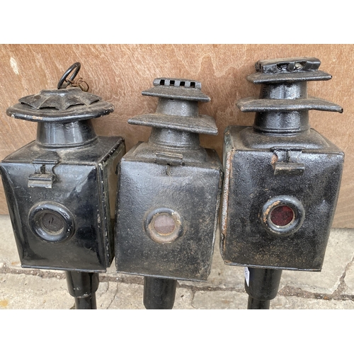 1223 - THREE VINTAGE PARAFIN POWERED COACH LAMPS