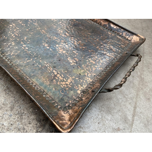 1236 - A VINTAGE ARTS AND CRAFTS HAND BEATEN COPPER TRAY STAMPED J.P