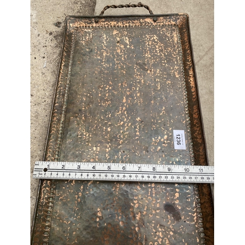 1236 - A VINTAGE ARTS AND CRAFTS HAND BEATEN COPPER TRAY STAMPED J.P