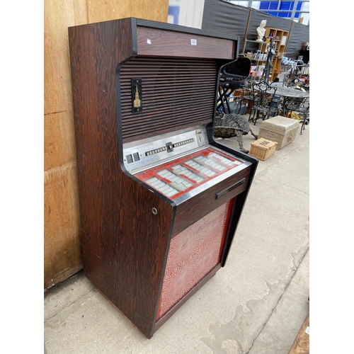 1201 - A VINTAGE WINCHESTER JUKEBOX MACHINE