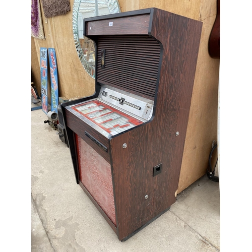 1201 - A VINTAGE WINCHESTER JUKEBOX MACHINE