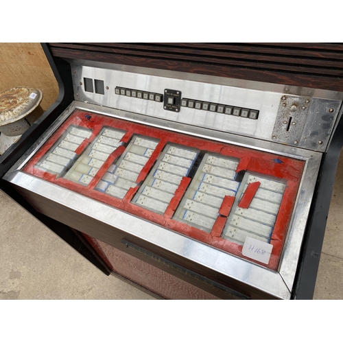 1201 - A VINTAGE WINCHESTER JUKEBOX MACHINE