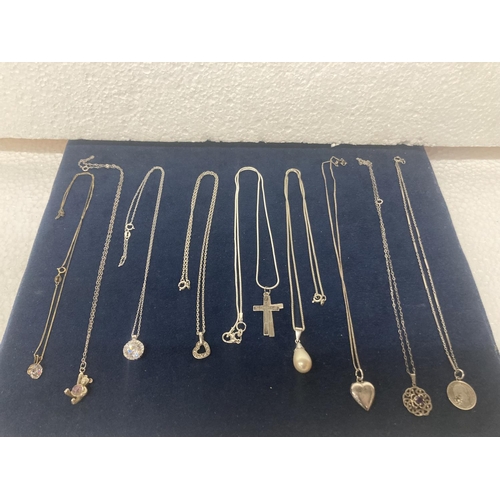 643 - NINE MARKED 925 SILVER NECKLACES WITH PENDANTS