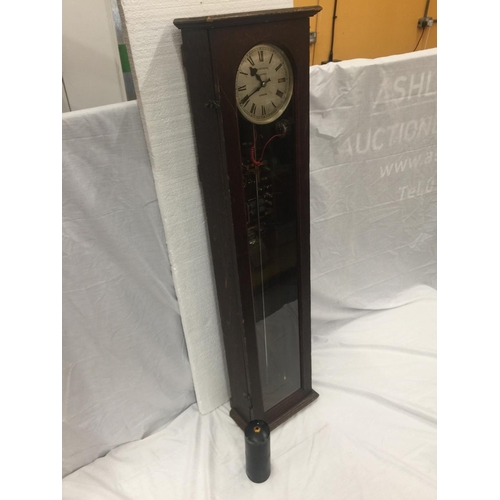 1 - A SYNCHRONOME ELECTRIC MASTER CLOCK IN WOODEN CASE WITH PENDULUM H: 128CM