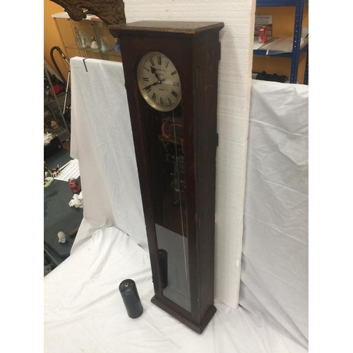 1 - A SYNCHRONOME ELECTRIC MASTER CLOCK IN WOODEN CASE WITH PENDULUM H: 128CM