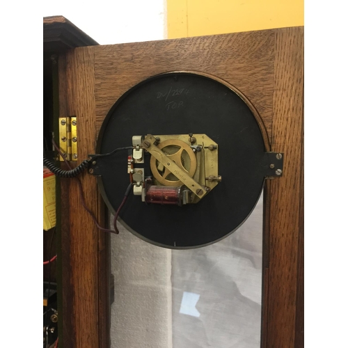 1 - A SYNCHRONOME ELECTRIC MASTER CLOCK IN WOODEN CASE WITH PENDULUM H: 128CM