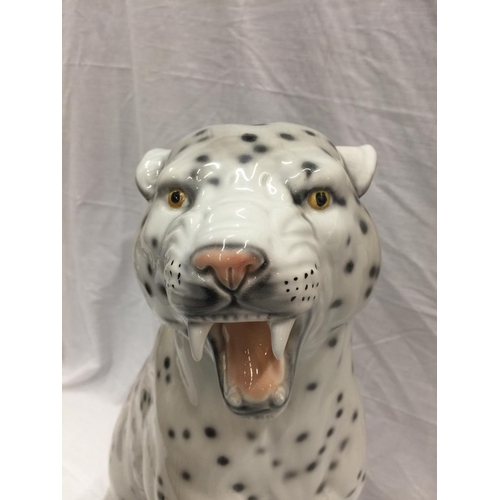 14 - A VERY LARGE ITALIAN MADE CERAMIC SNOW LEOPARD INSCRIBED WITH INDISTINCT SIGNATURE TO BASE, HAS SOME... 