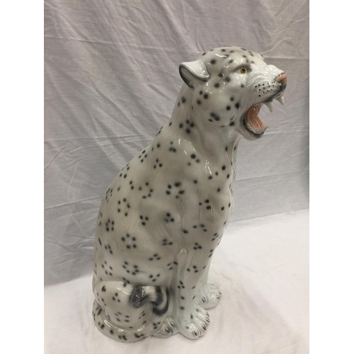 14 - A VERY LARGE ITALIAN MADE CERAMIC SNOW LEOPARD INSCRIBED WITH INDISTINCT SIGNATURE TO BASE, HAS SOME... 