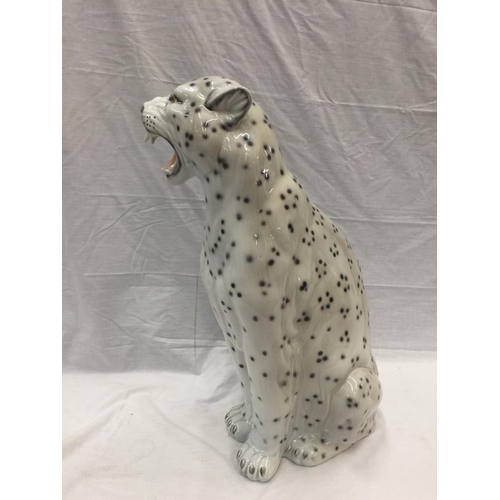 14 - A VERY LARGE ITALIAN MADE CERAMIC SNOW LEOPARD INSCRIBED WITH INDISTINCT SIGNATURE TO BASE, HAS SOME... 