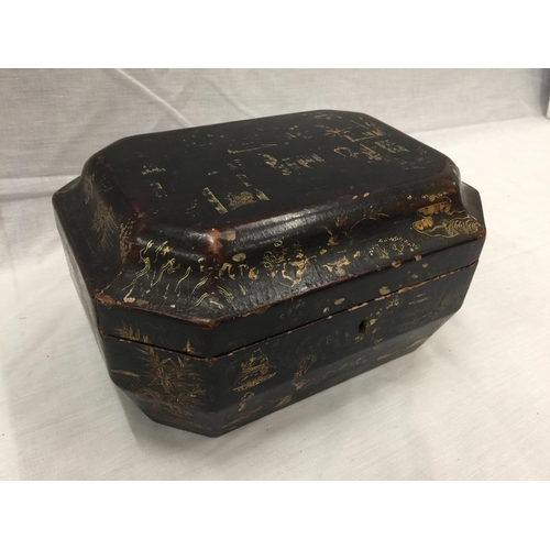 16 - A CHINOISERIE DECORATED SARCOPHAGUS SHAPED BOX WITH ORIENTAL STYLING