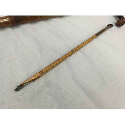 27 - A SILVER TOPPED WALKING CANE MARKED H.S. GUARDS CLUB AND CONSEALED HORSE MEASURING STICK A/F