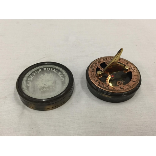 29 - A BRASS ROYAL NAVY SUNDIAL COMPASS IN A CASE W: 7CM