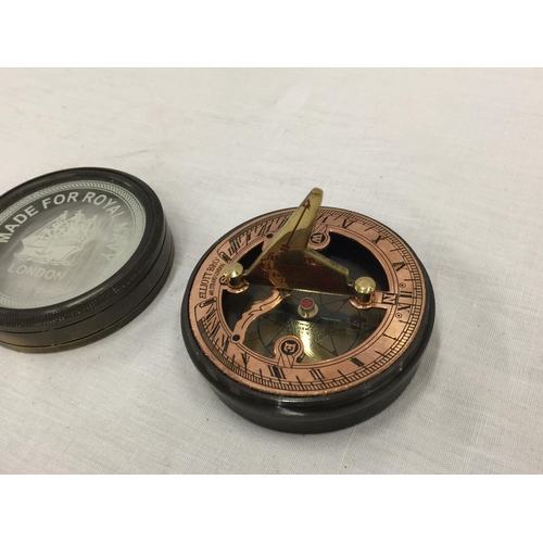 29 - A BRASS ROYAL NAVY SUNDIAL COMPASS IN A CASE W: 7CM