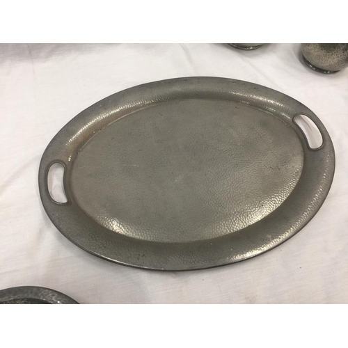 6 - A HAND HAMMERED SIX PIECE TUDRIC PEWTER SET