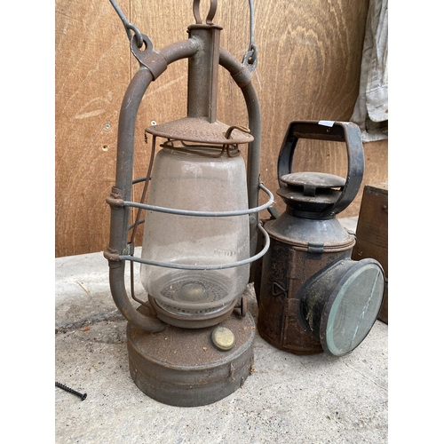 1255 - A VINTAGE ROAD LAMP AND A VINTAGE PARAFIN LAMP