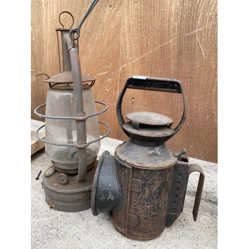 1255 - A VINTAGE ROAD LAMP AND A VINTAGE PARAFIN LAMP