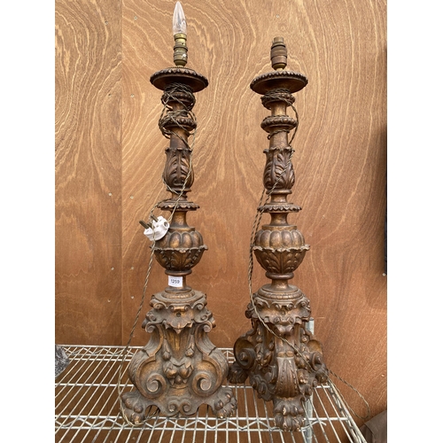 1259 - A PAIR OF HIGHLY DECORATIVE WOODEN CARVED TABLE LAMPS