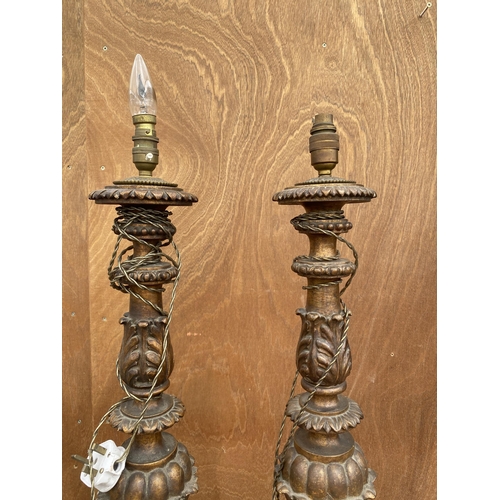 1259 - A PAIR OF HIGHLY DECORATIVE WOODEN CARVED TABLE LAMPS