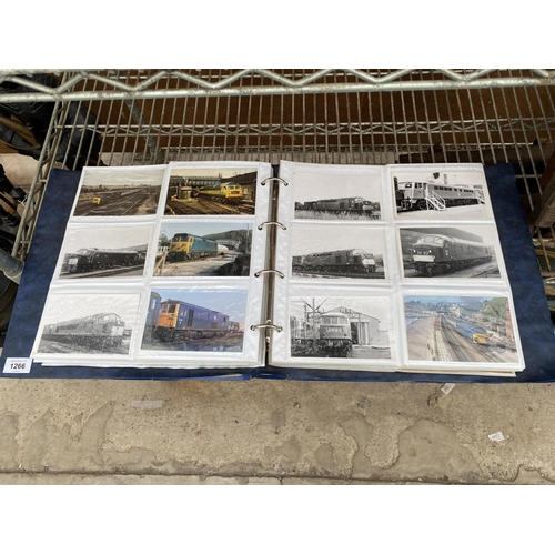 1266 - A PHOTO ALBUM CONTAINING A LARGE COLLETION OF TRAIN POST CARDS