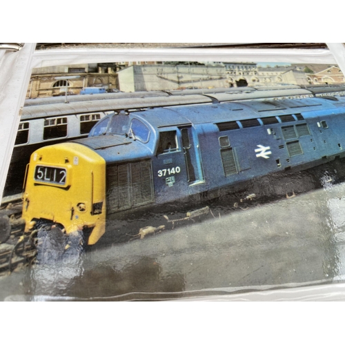 1266 - A PHOTO ALBUM CONTAINING A LARGE COLLETION OF TRAIN POST CARDS