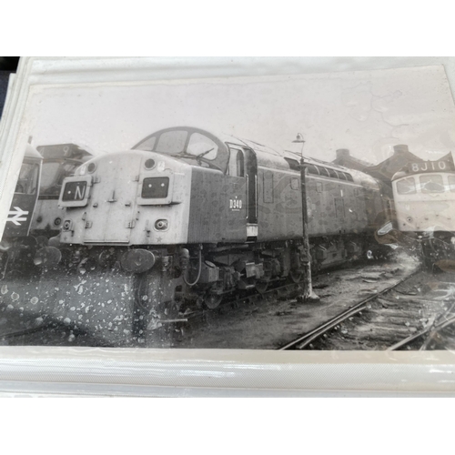 1266 - A PHOTO ALBUM CONTAINING A LARGE COLLETION OF TRAIN POST CARDS