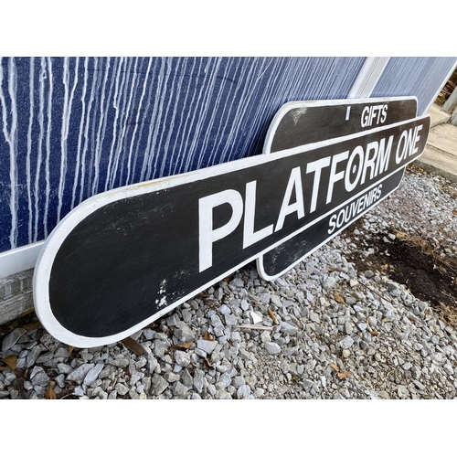 1280 - A WOODEN PAINTED 'PLATFORM ONE' SIGN (L:243CM H:46CM)