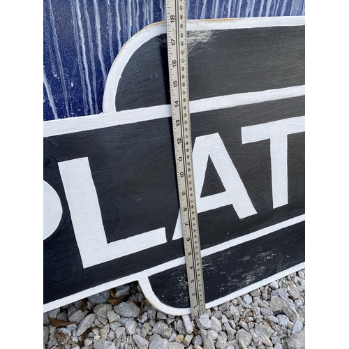 1280 - A WOODEN PAINTED 'PLATFORM ONE' SIGN (L:243CM H:46CM)